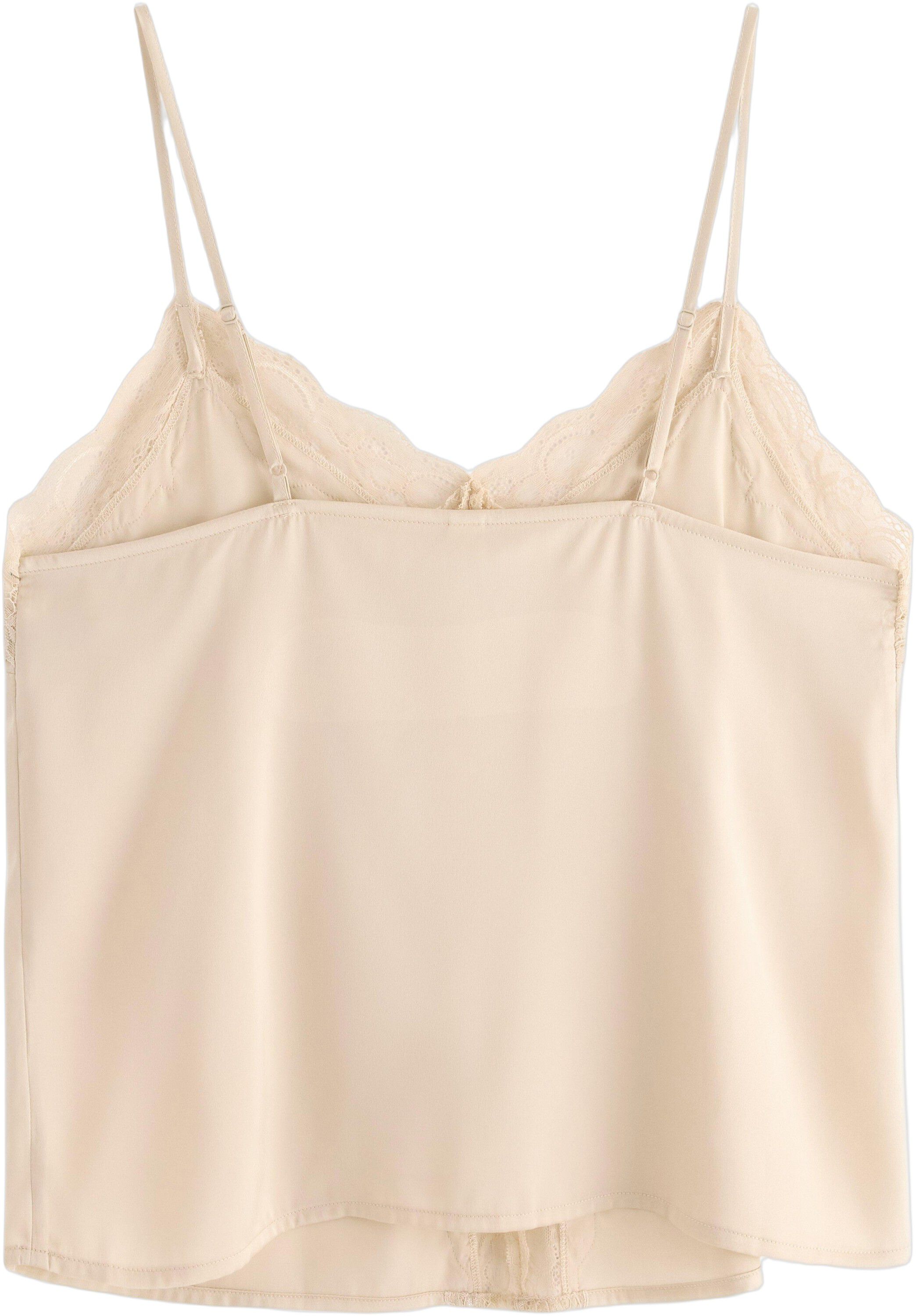 Satin camisole with lace details.