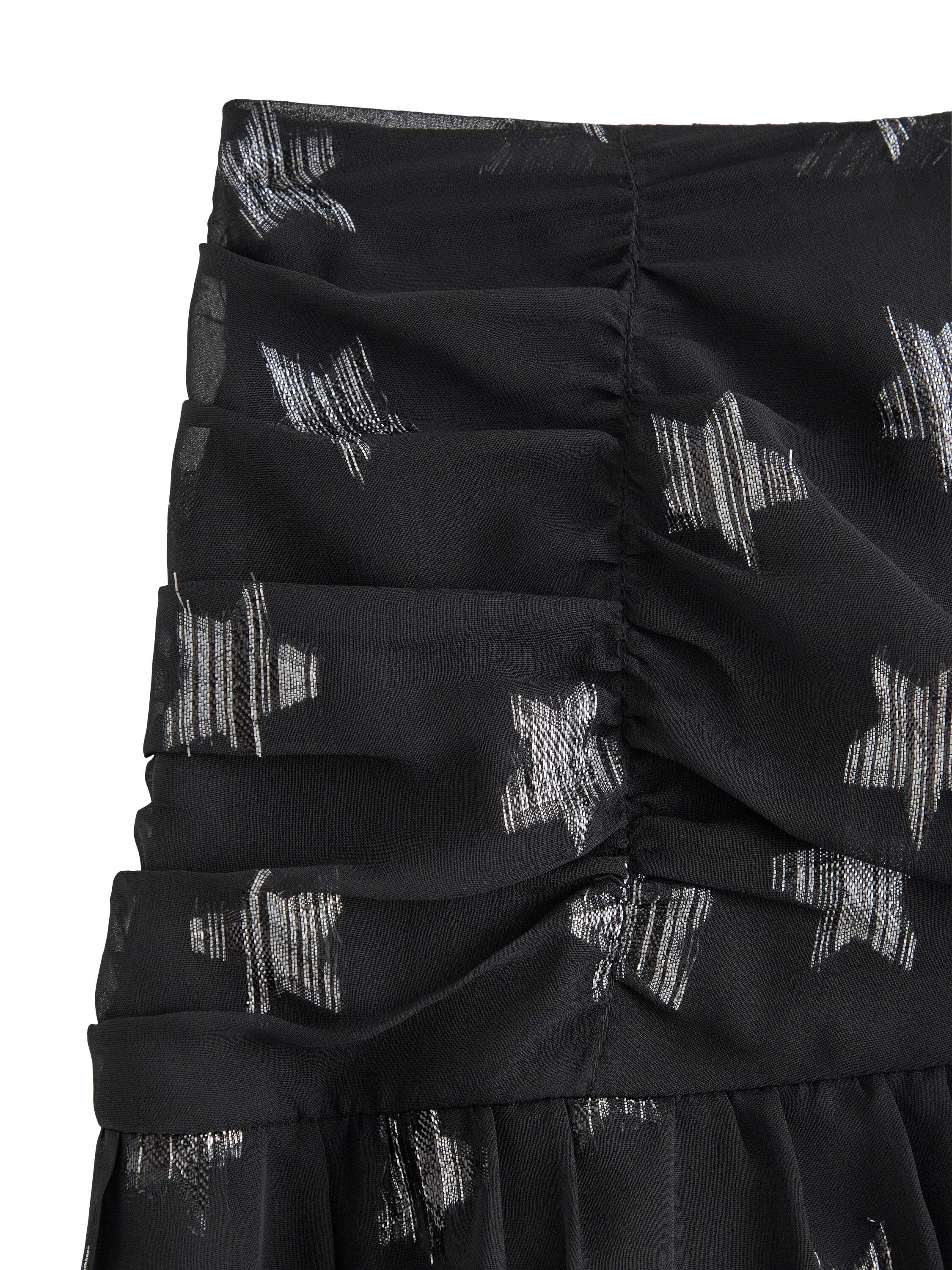 Lett skj&oslash;rt i chiffong med stjerner