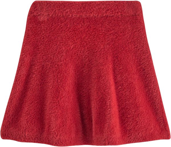 Mjukt utsvängd kjol i fjädergarn.