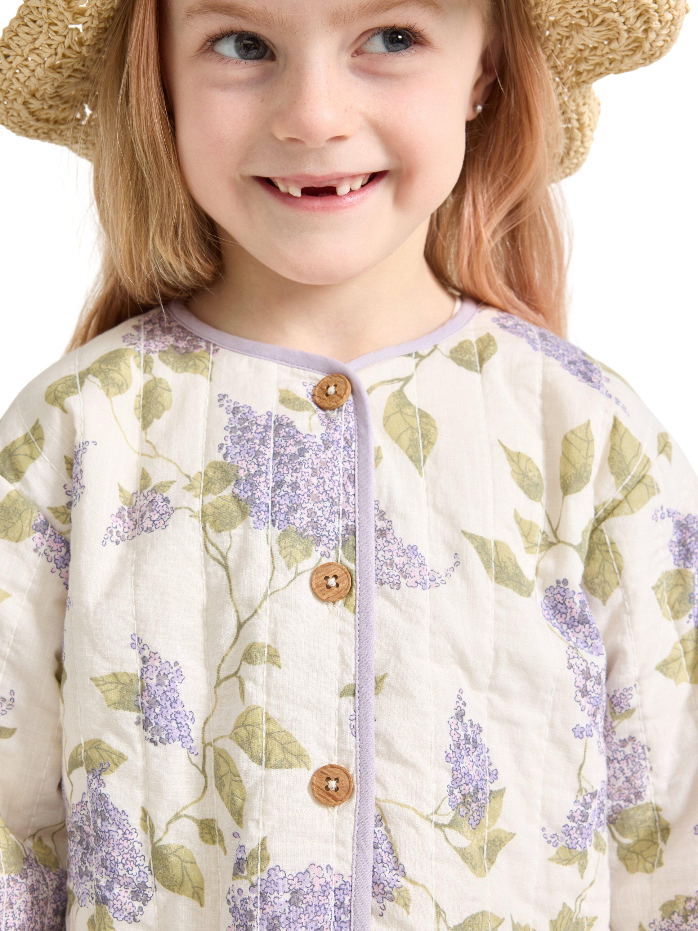 Jacket in quilted material with but