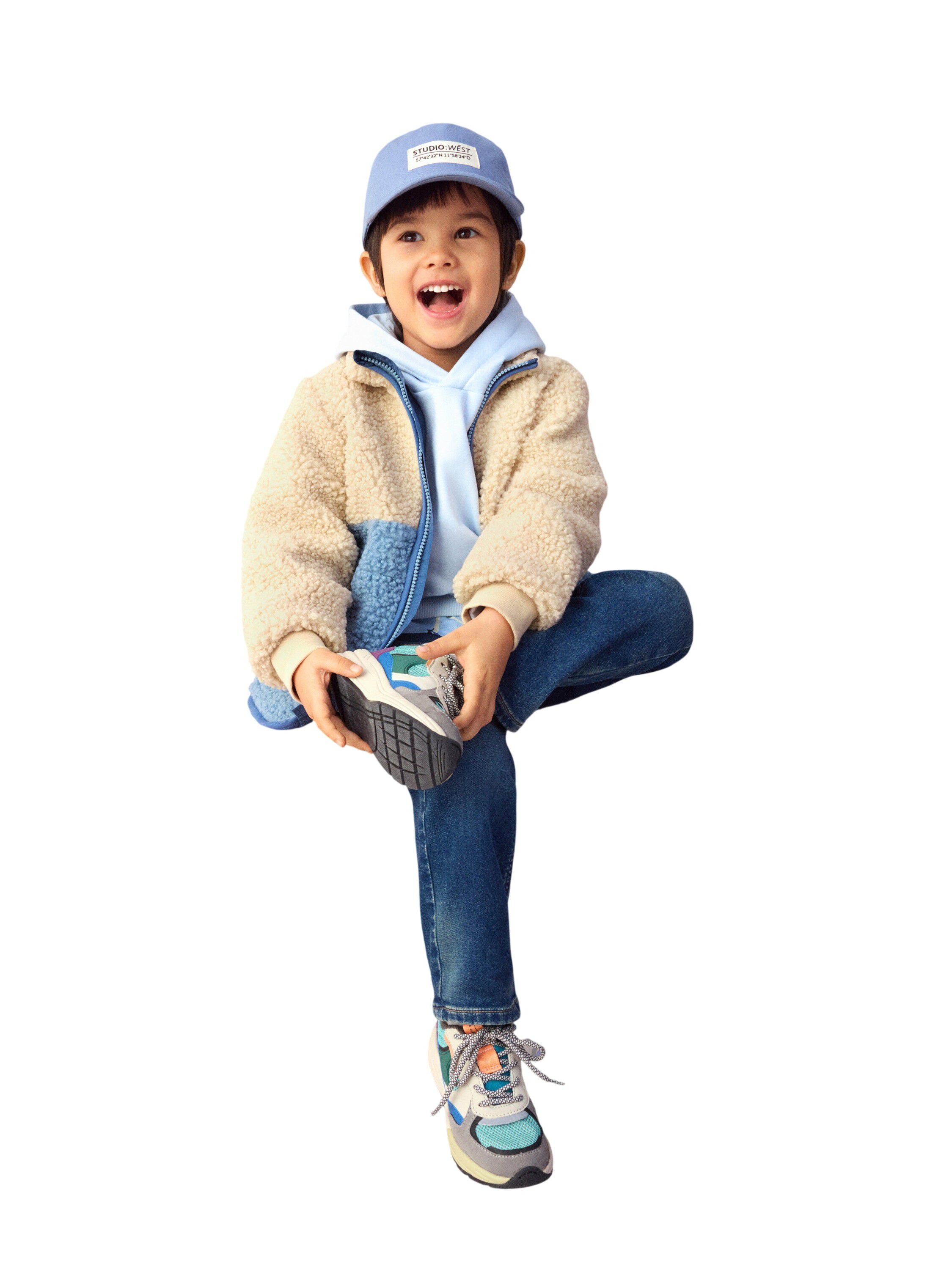 En varm och mysig pilejacka med sid