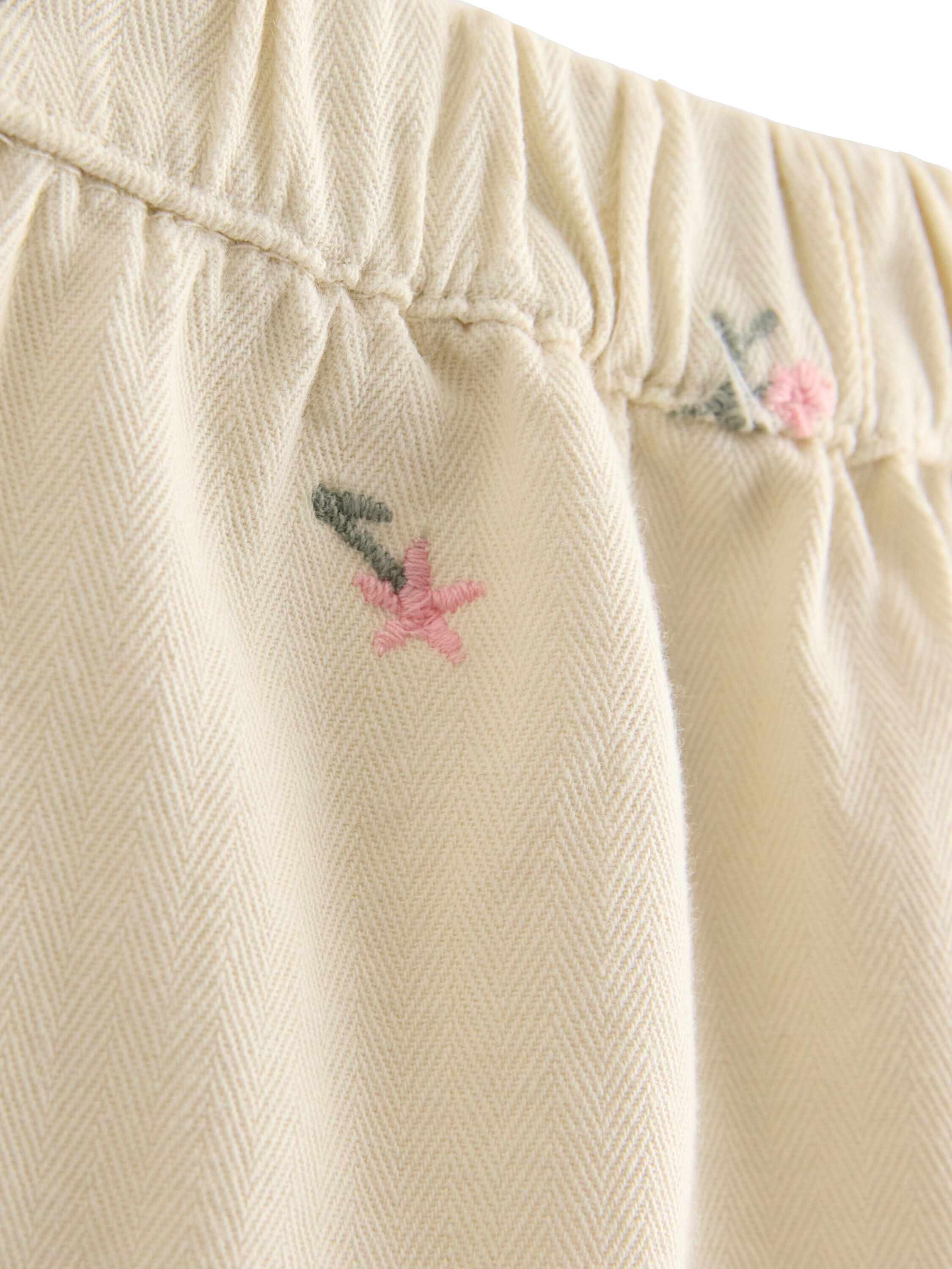 Trousers woven emb