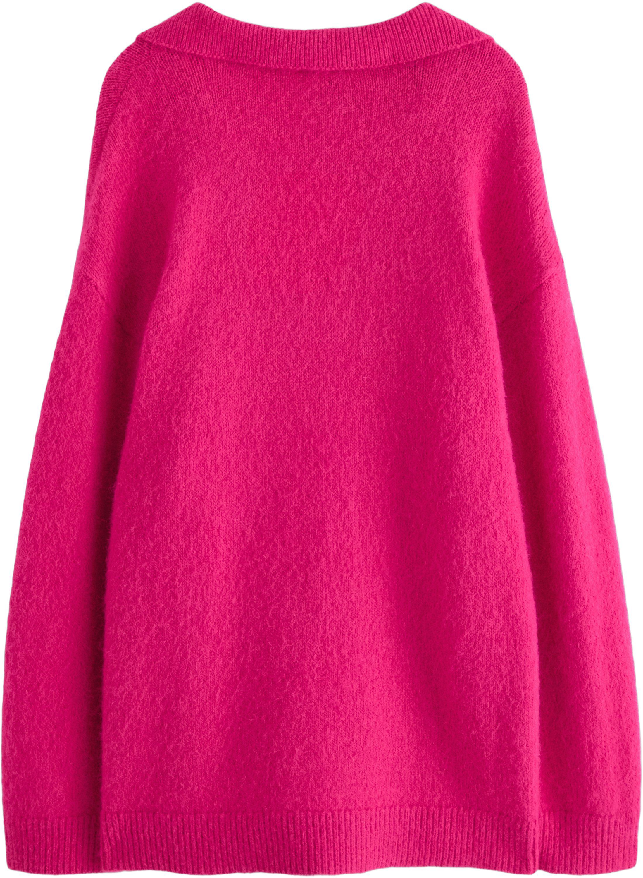 Oversize stickad tr&ouml;ja med v-ringni