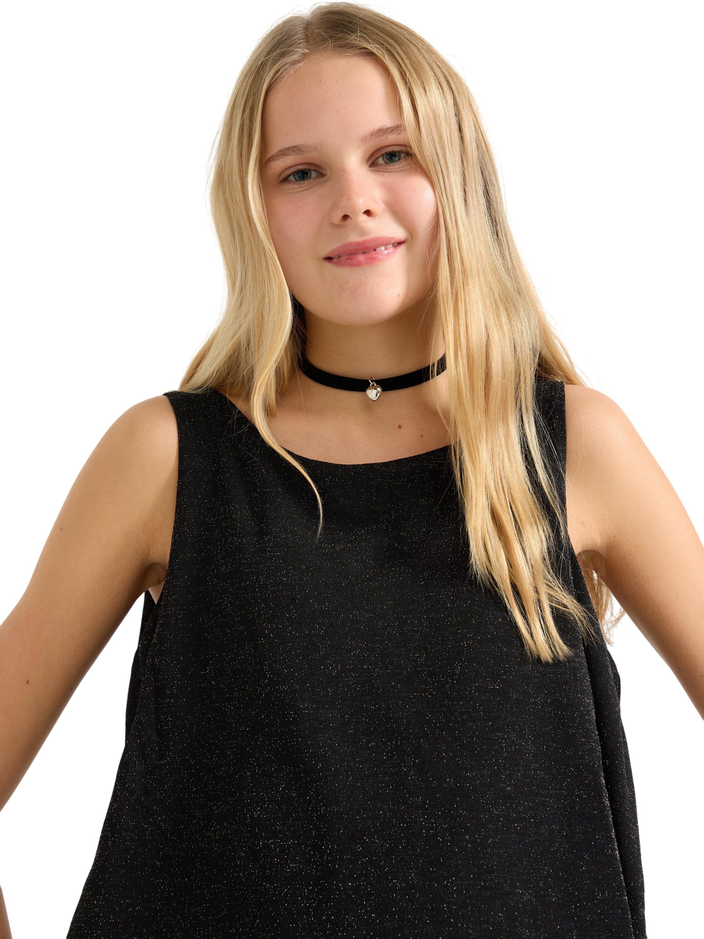 Glitrende, &aelig;rmel&oslash;s buksedragt med b