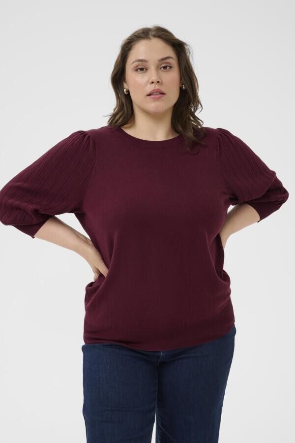 Kortermet strikkegenser