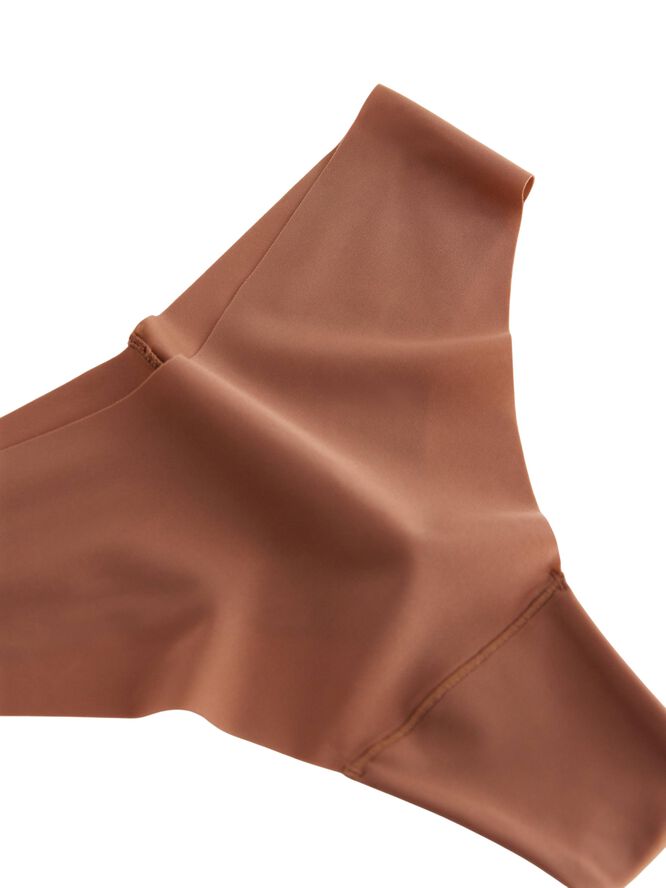 Usynlig string med normal midje