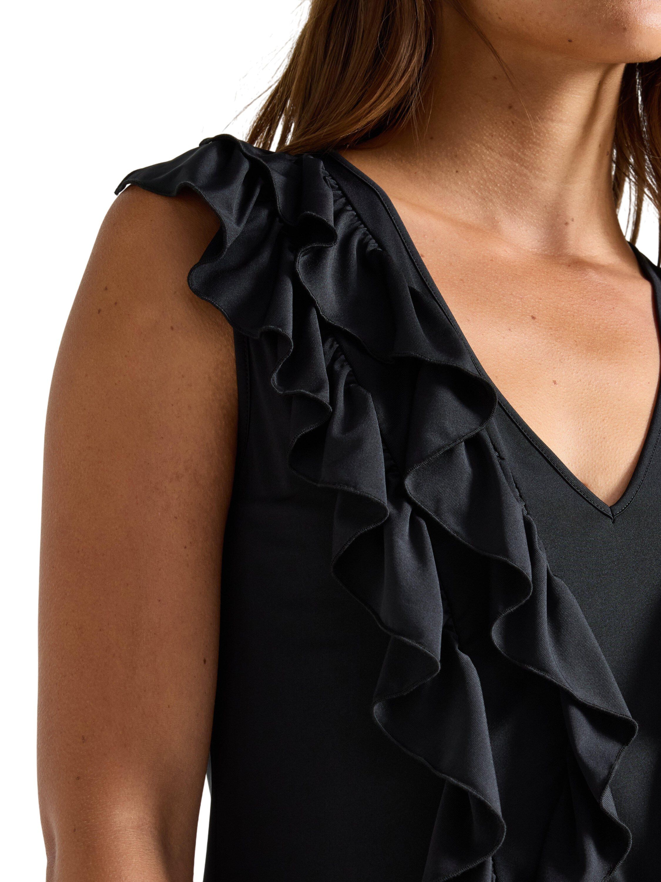 �rml&ouml;s topp i mjuk trik&aring; med vol