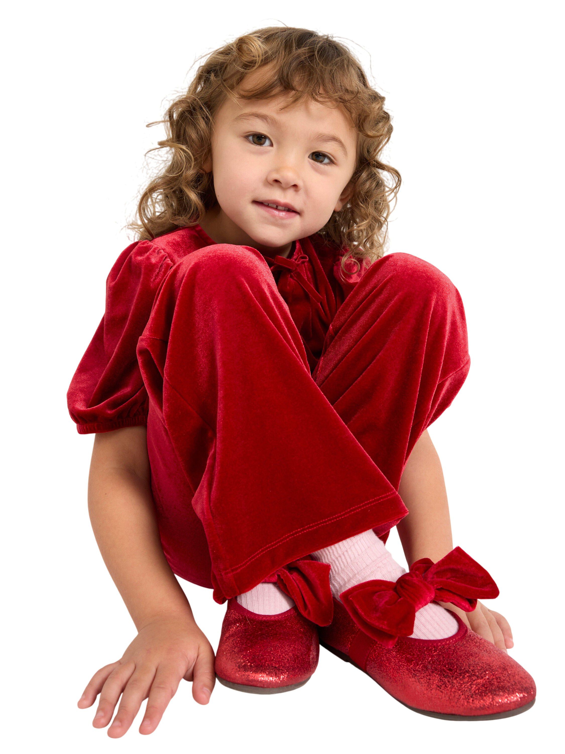 Soft trousers in velvet with an ela