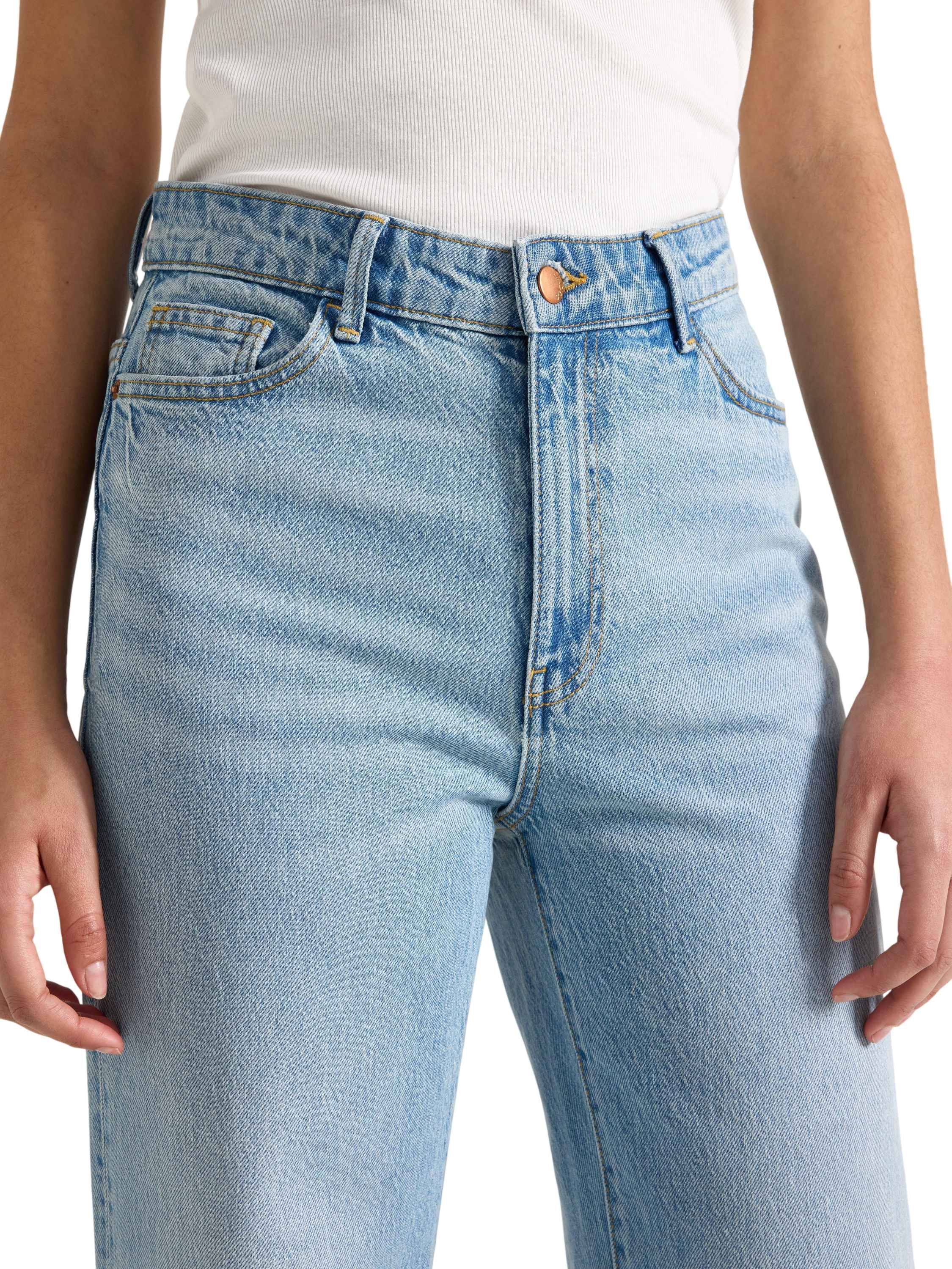 H&oslash;jtaljede jeans i bomuldsdenim med