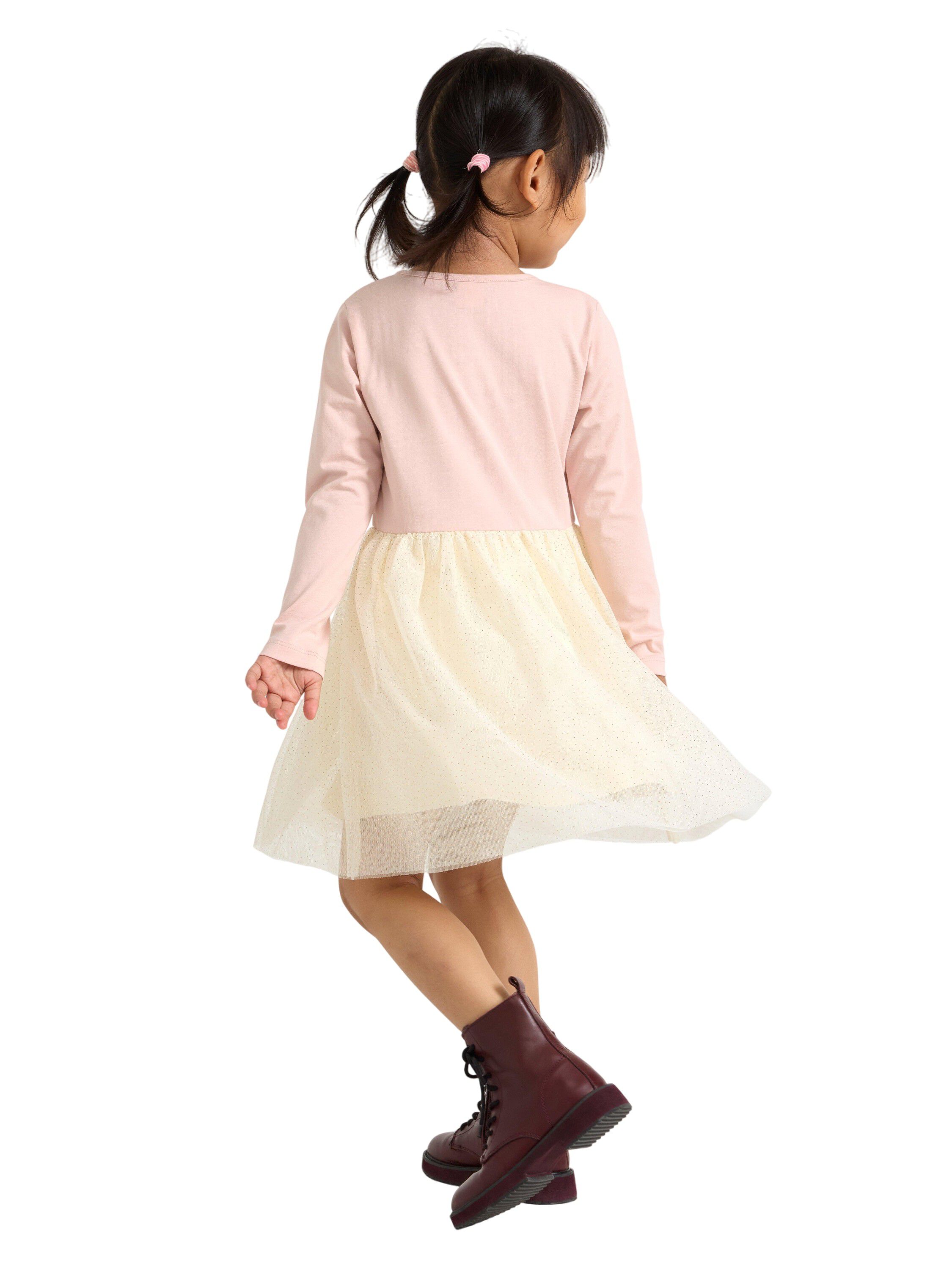 L&aring;ng&auml;rmad kl&auml;nning med n&auml;tskjorta.