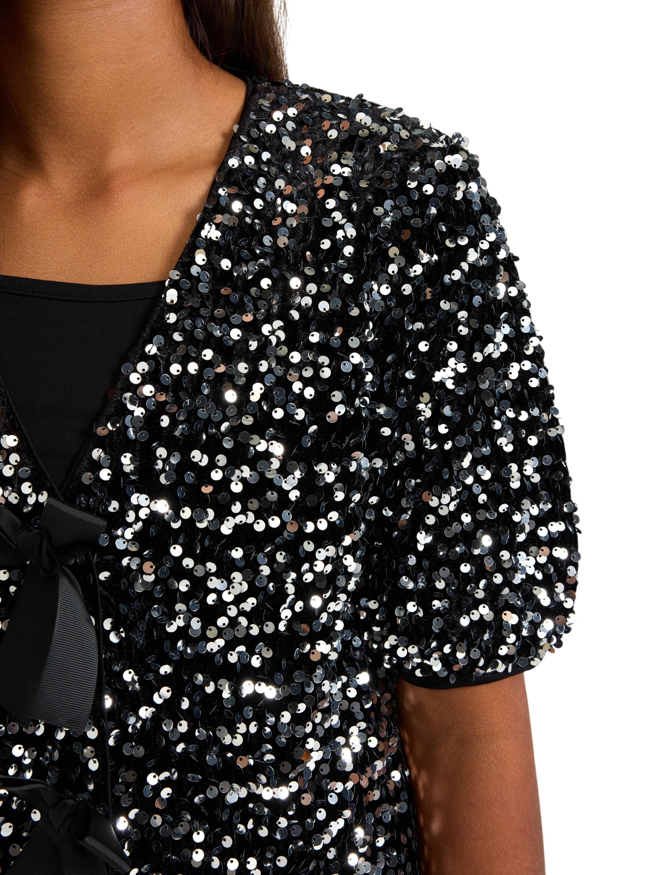 Kort&auml;rmad topp med paljetter och ro