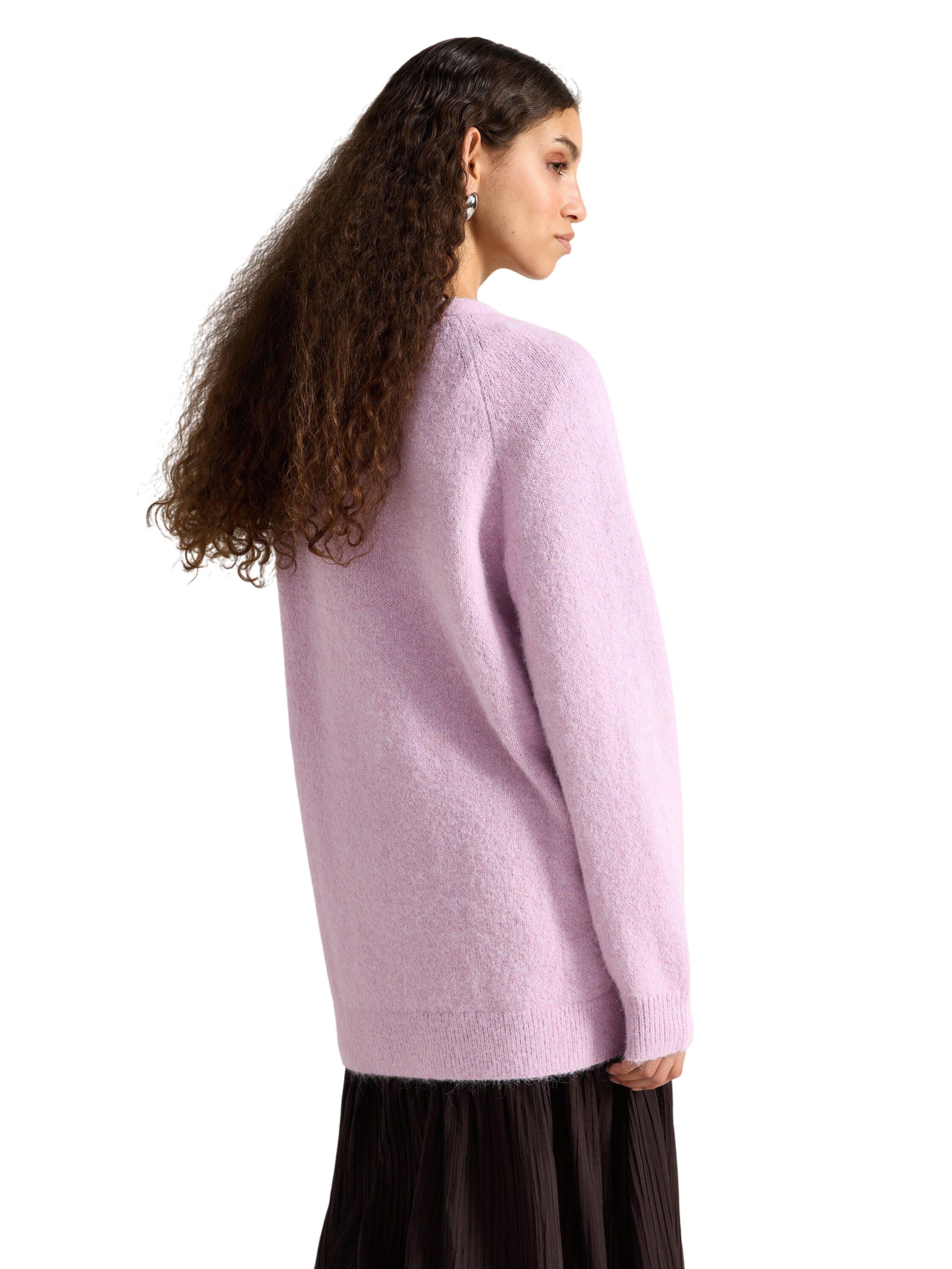 Knitted cardigan with a slightly lo