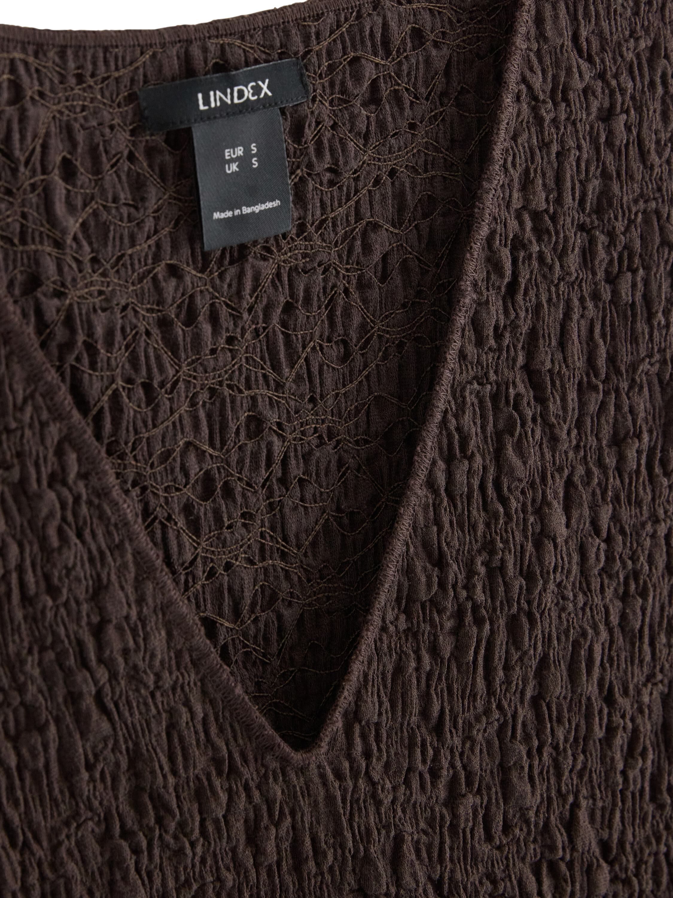 Structured sleeveless top in jersey