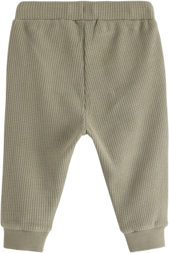 Joggers in waffled cotton with appl