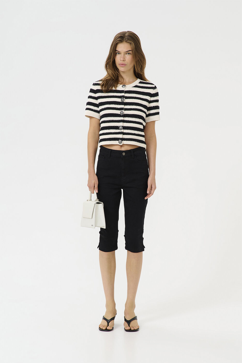 Kortermet strikkegenser