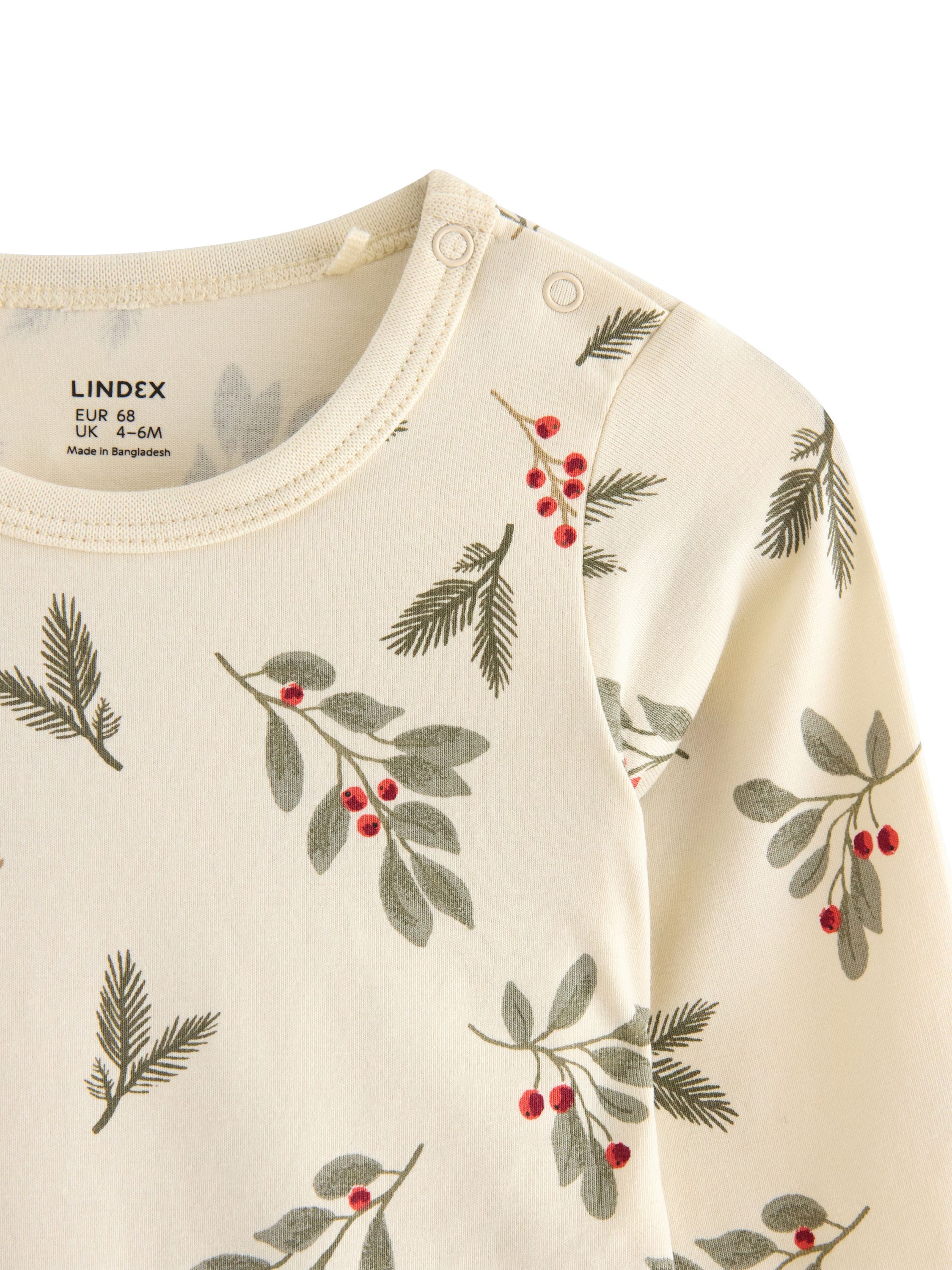 L&aring;ng&auml;rmad body i mjuk bomullstrik&aring;.