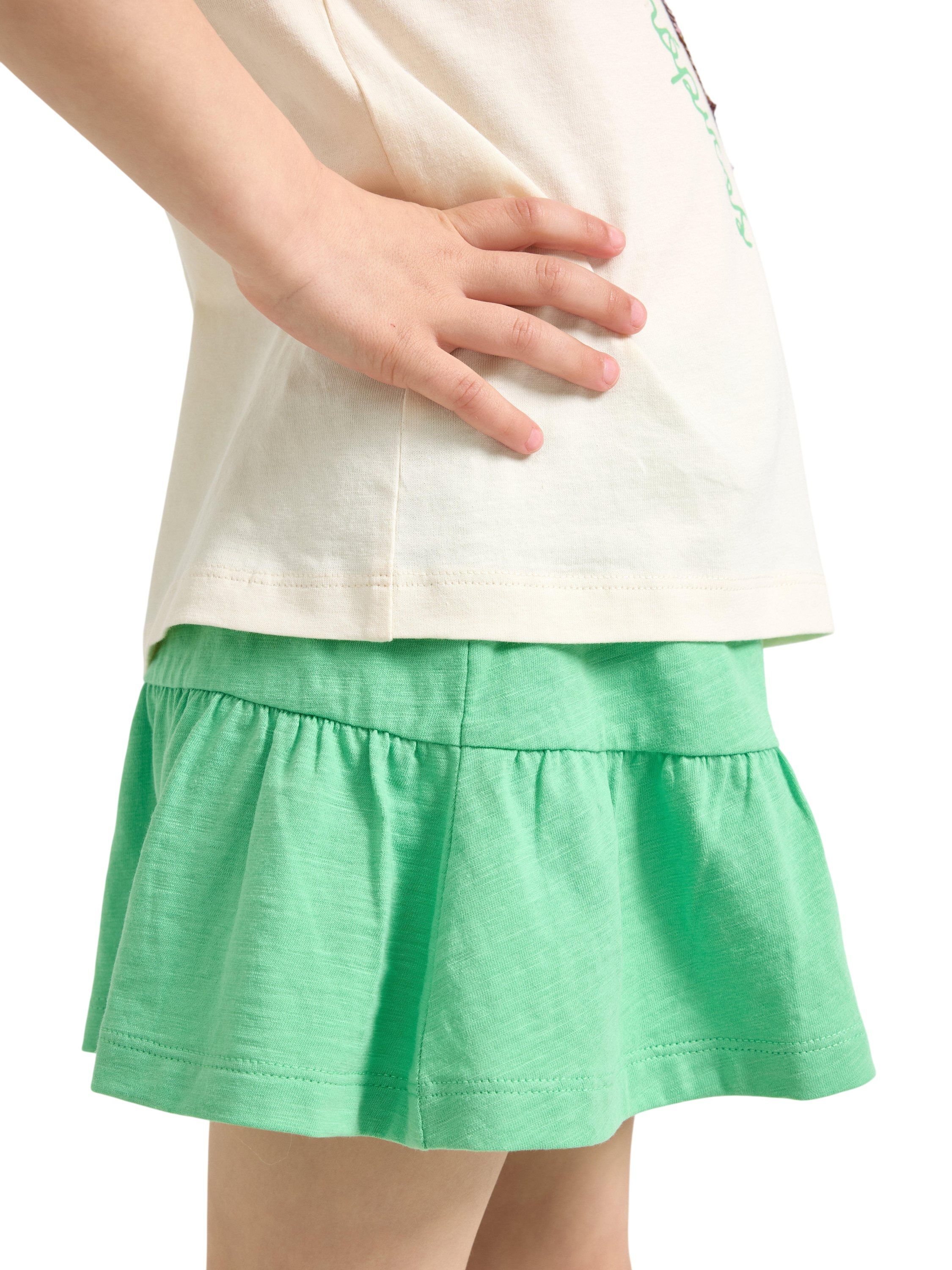 Jersey-shorts som ser ut som et skj