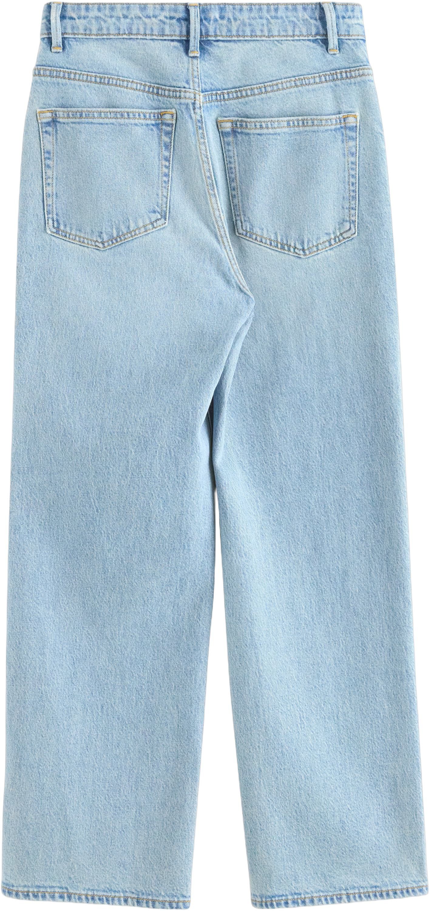 H&oslash;jtaljede jeans i bomuldsdenim med