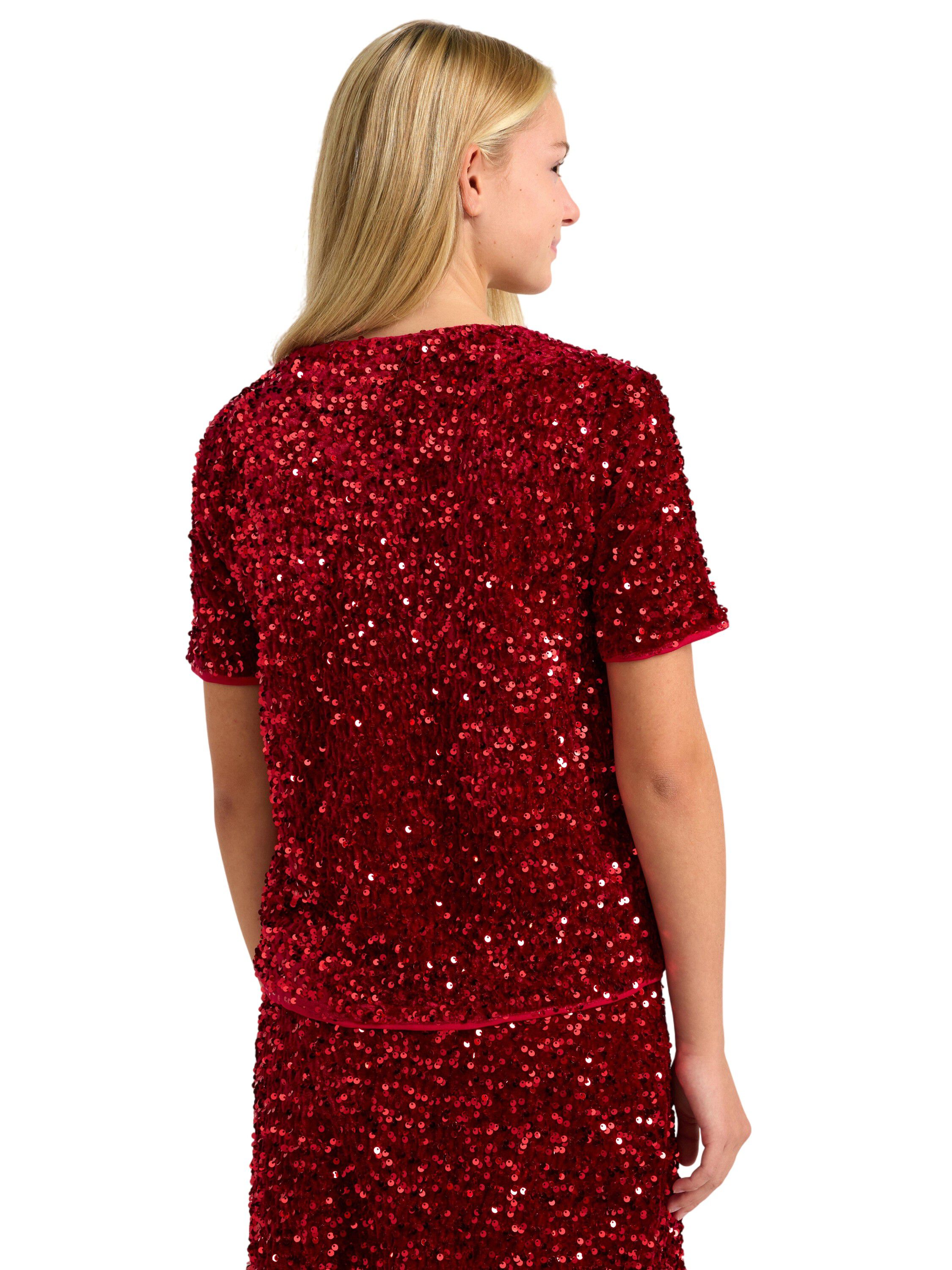 Glitrende kortermet topp med fl&oslash;yel