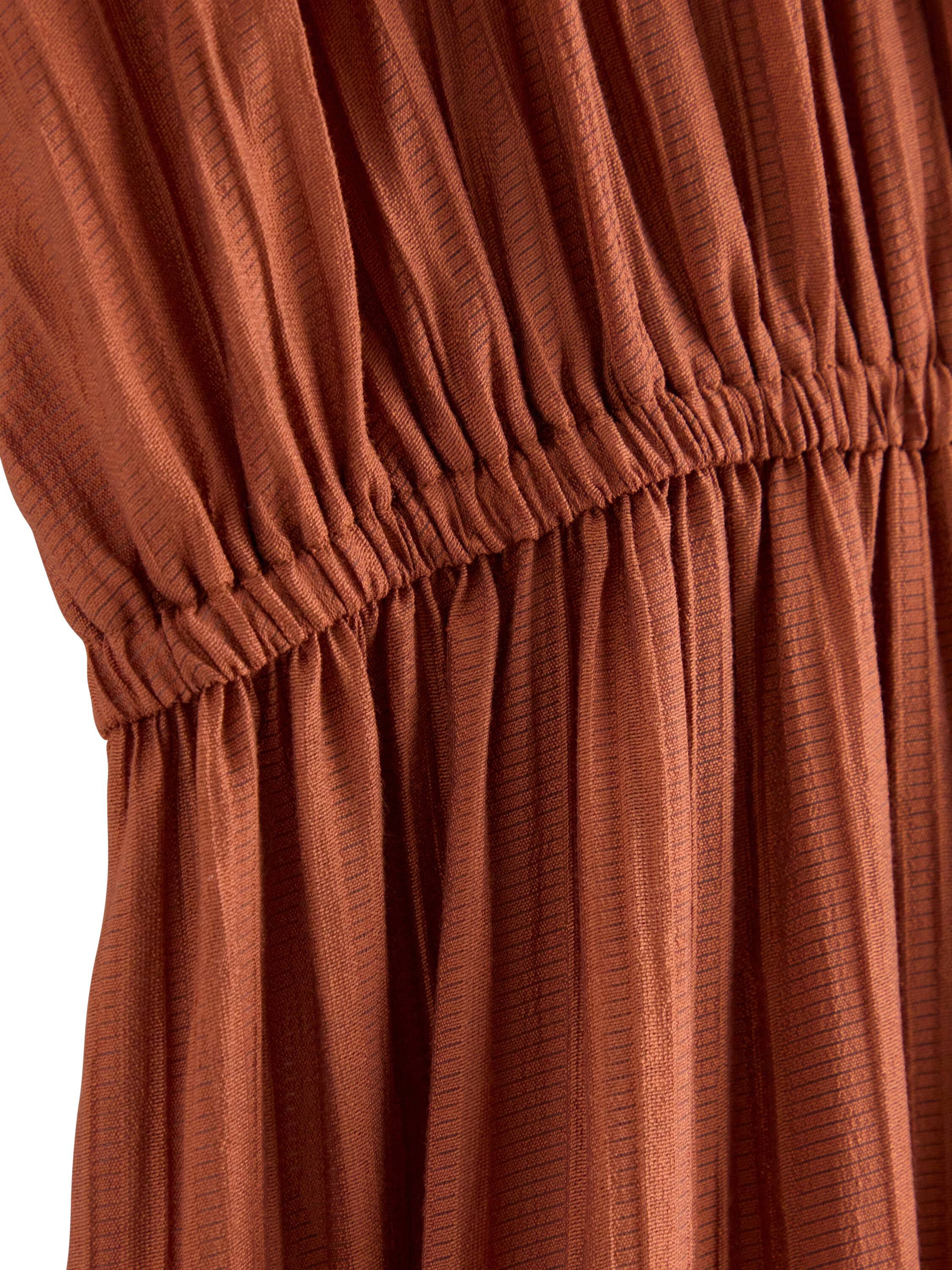 Midi dress with flounces and v-neck