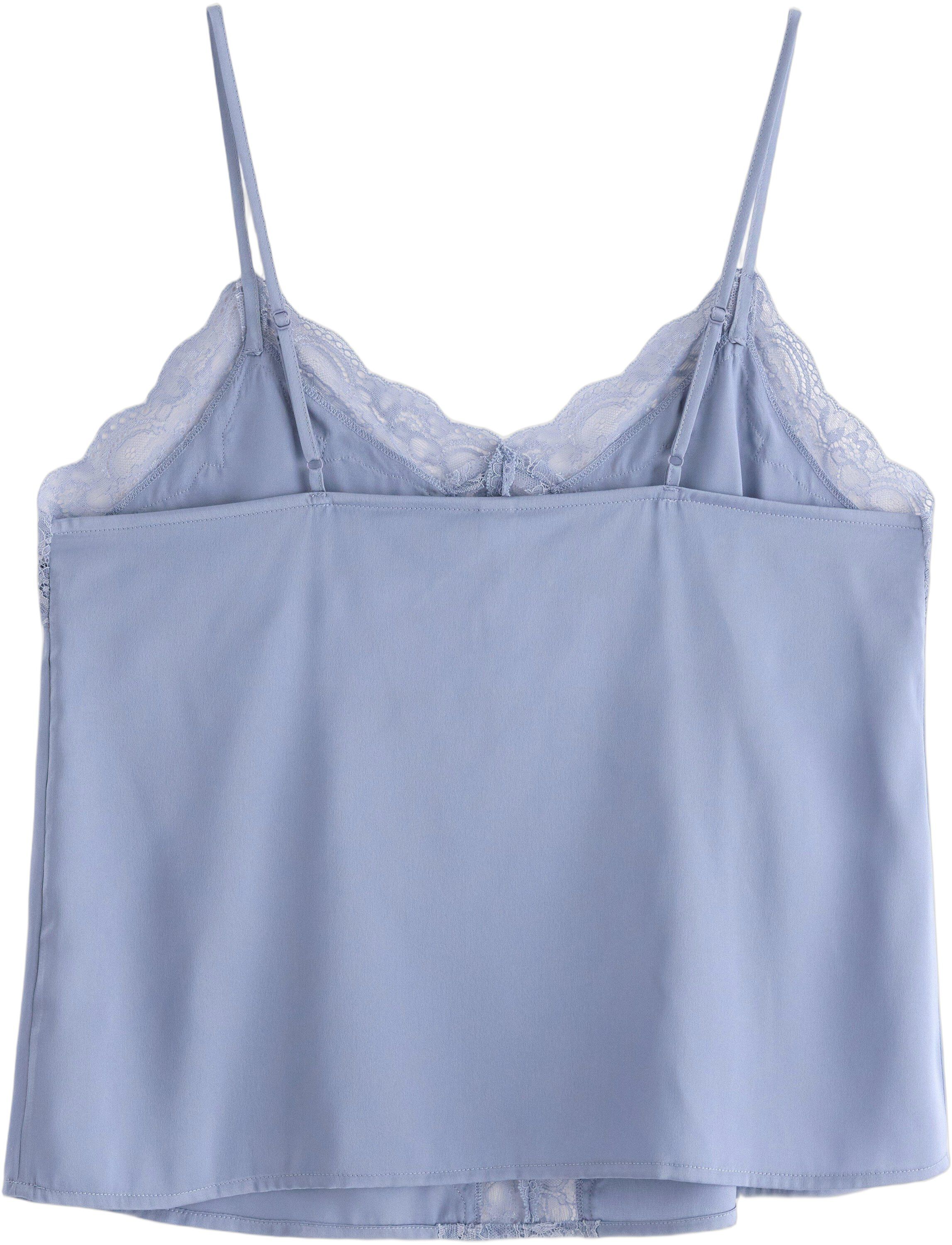 Satin camisole with lace details.