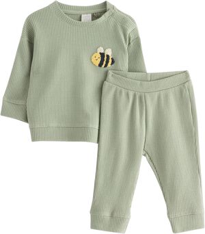 Mjukt set i v&aring;fflad bomull med en s