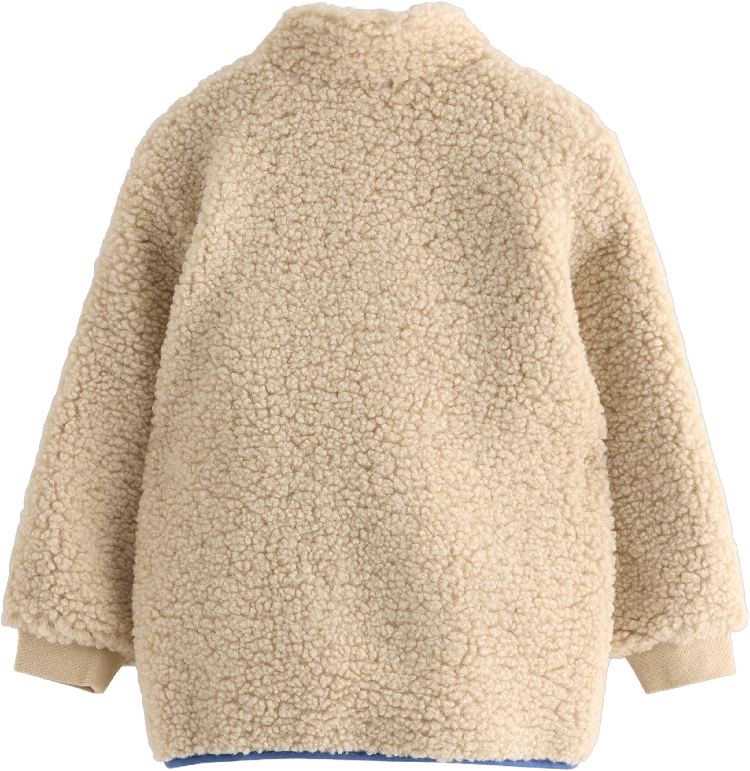 En varm och mysig pilejacka med sid