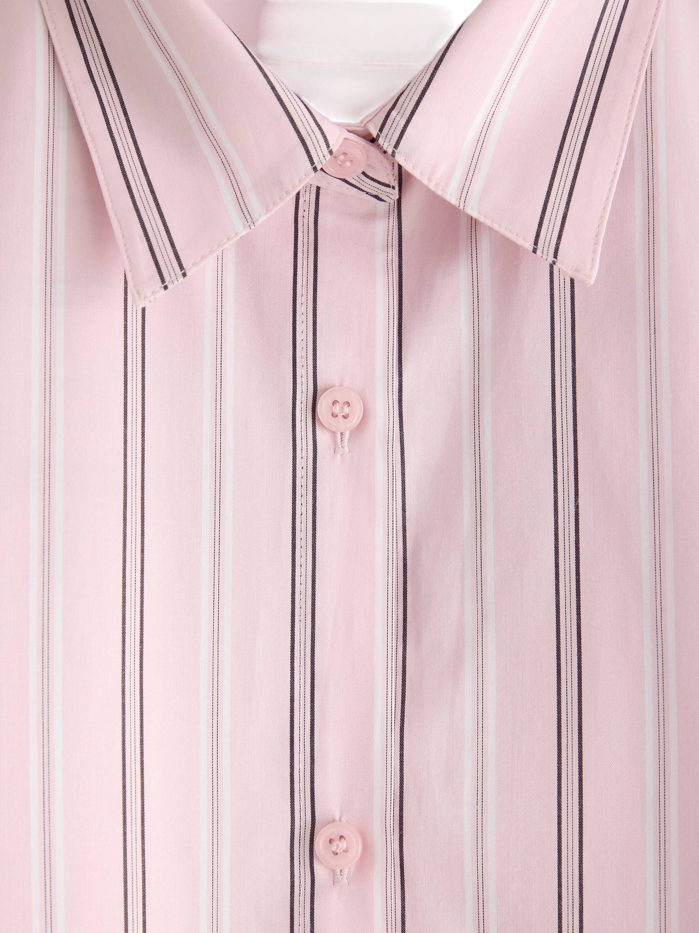 Long striped shirt with button clos