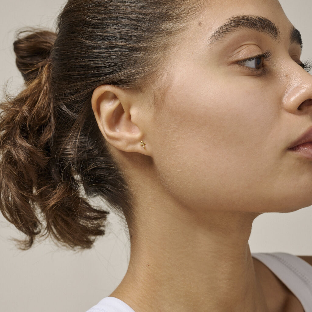 Studs, Protective Cross