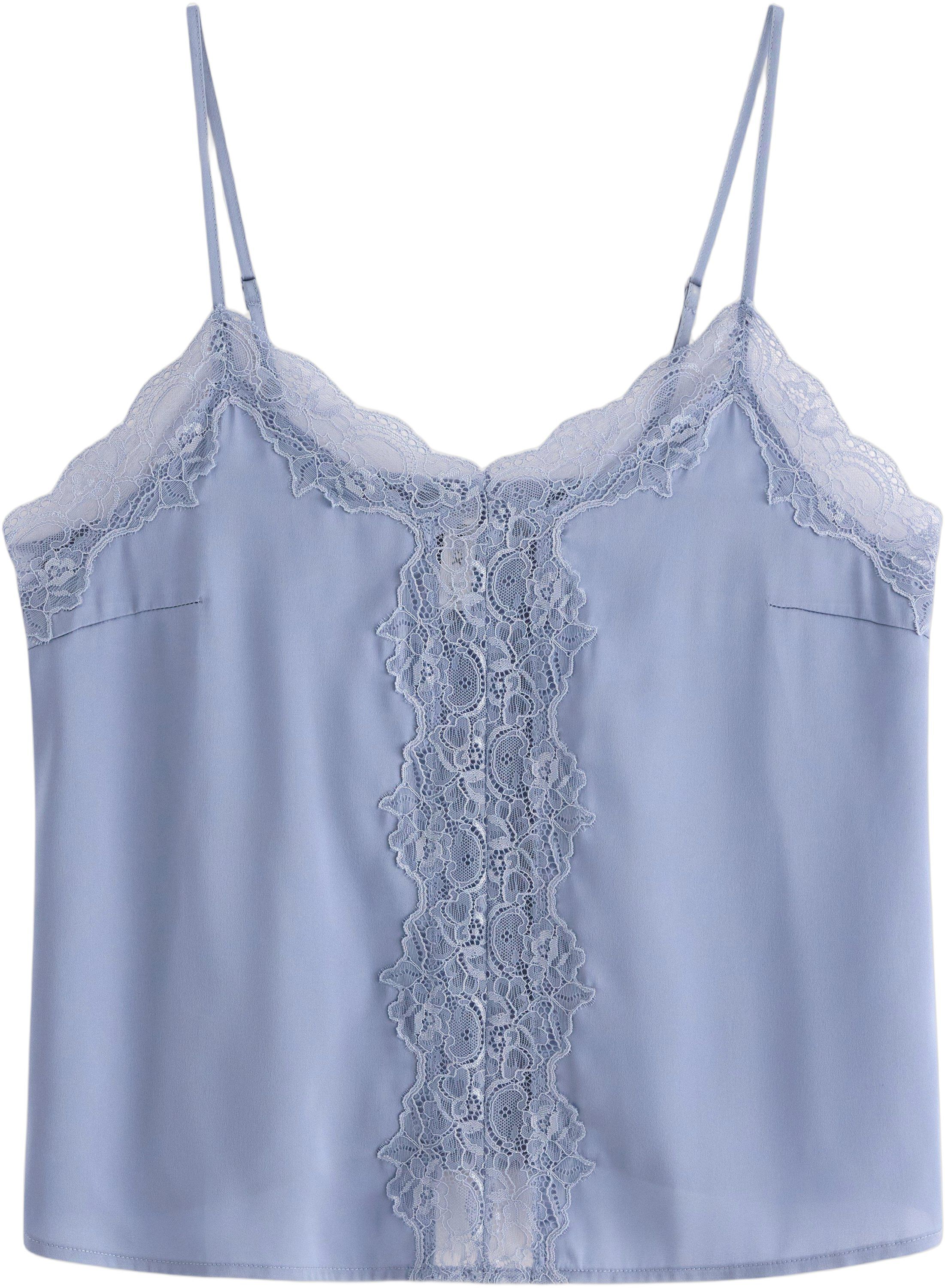 Satin camisole with lace details.