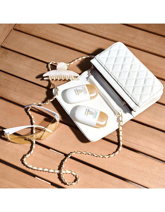 Sun Perfect AIR Daily Invisible Fluid Glow Booster SPF50 40 ml