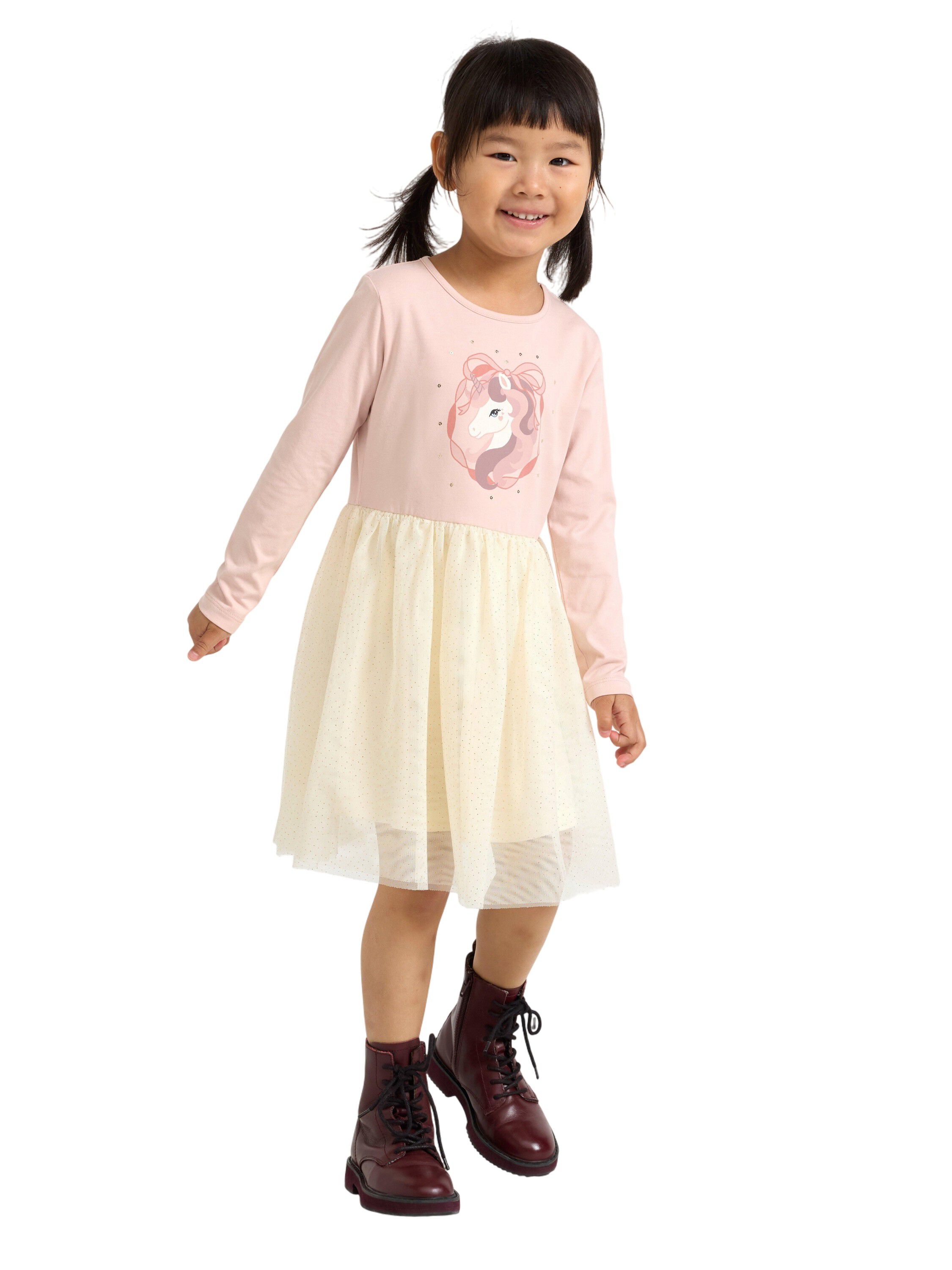 L&aring;ng&auml;rmad kl&auml;nning med n&auml;tskjorta.