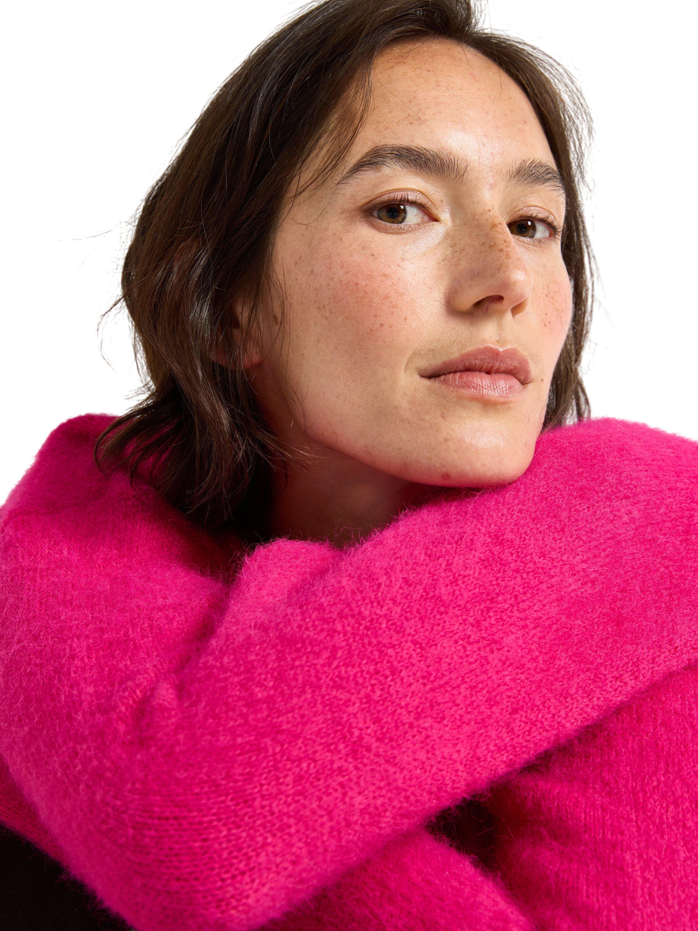 Oversize stickad tr&ouml;ja med v-ringni