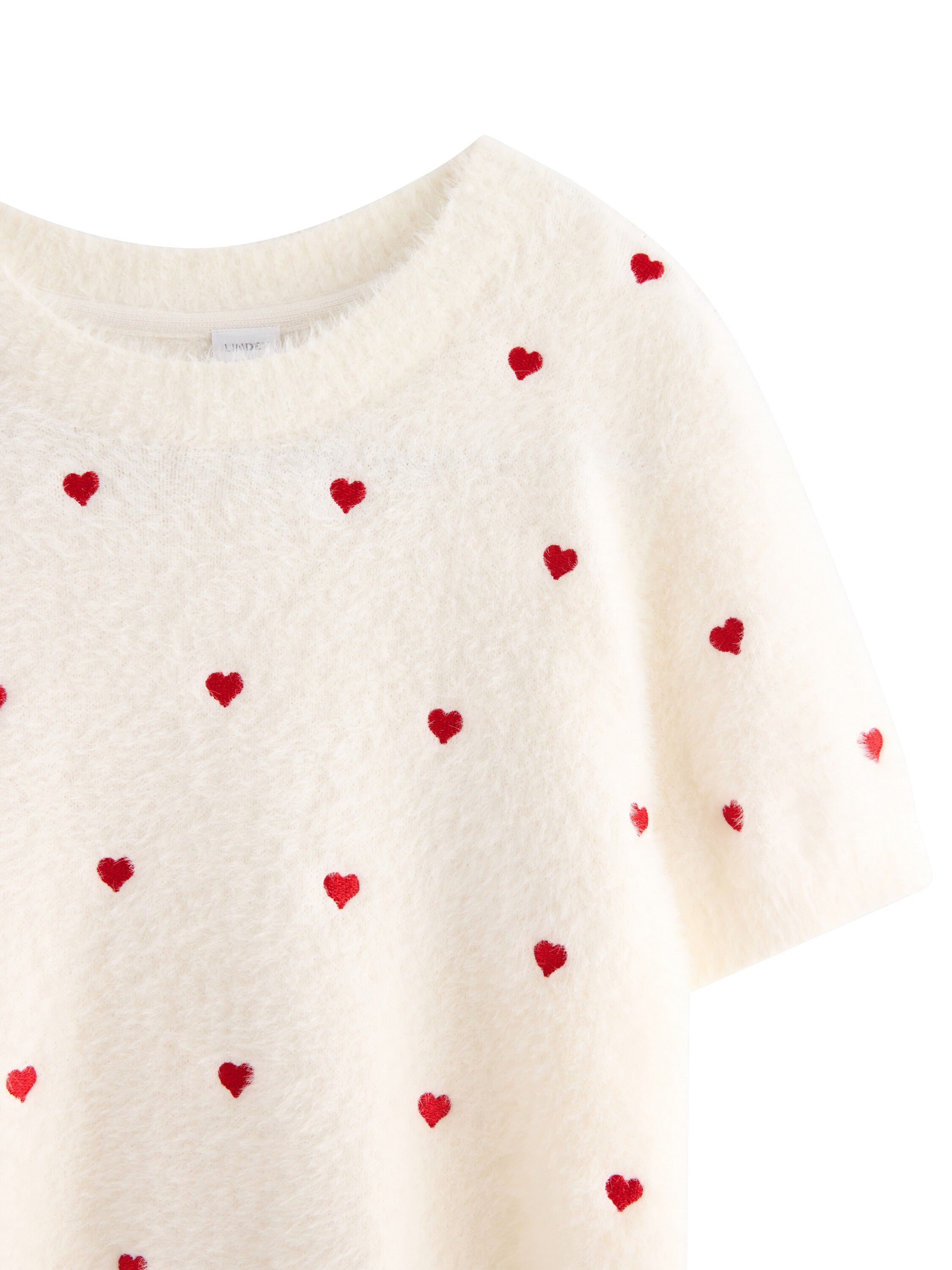 Kort&aelig;rmet strikket top i bl&oslash;dt fjer