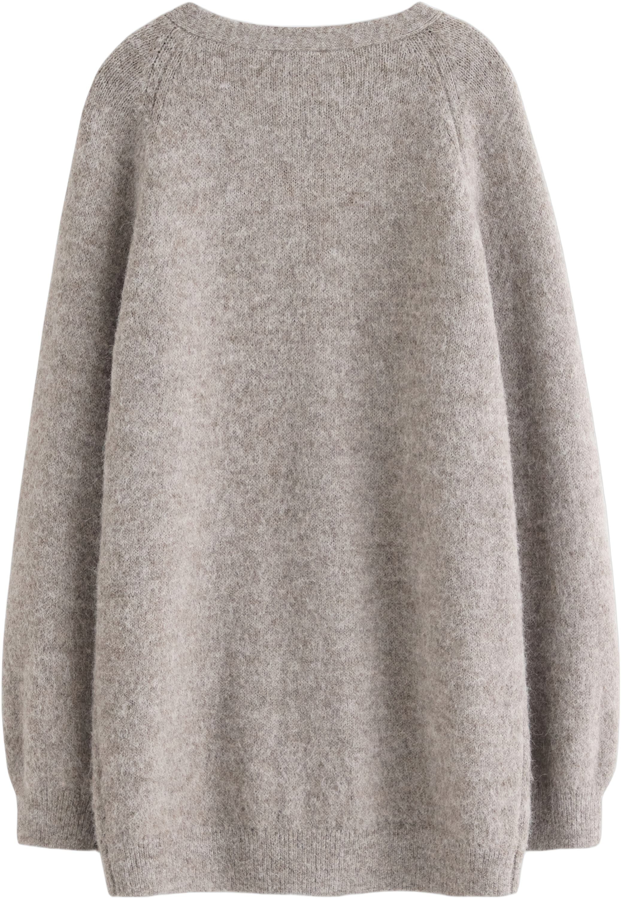 Strikket cardigan med en lidt l&aelig;nge