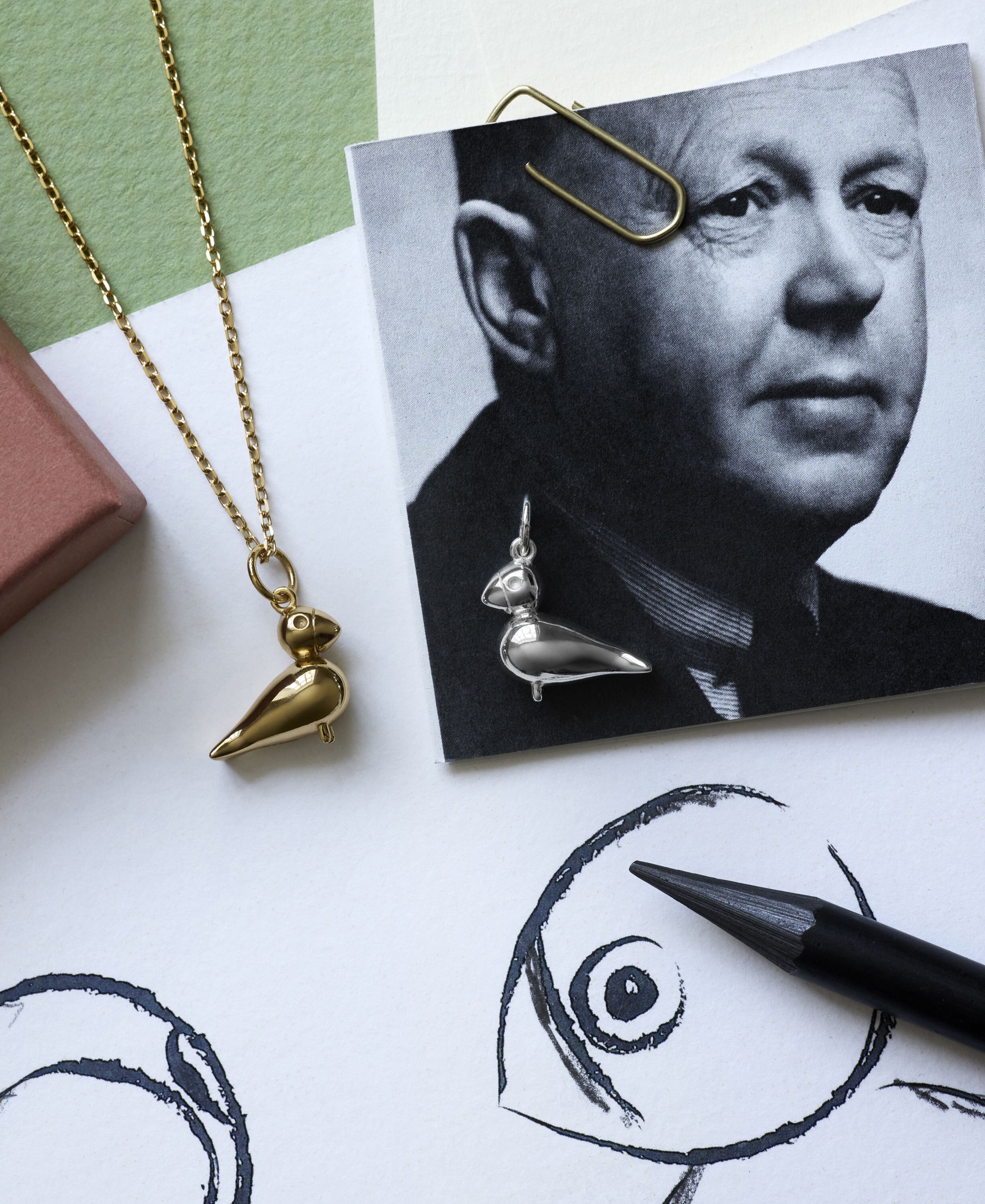 Sangfugl i 18 karat forgyldt s&oslash;lv uden k&aelig;de