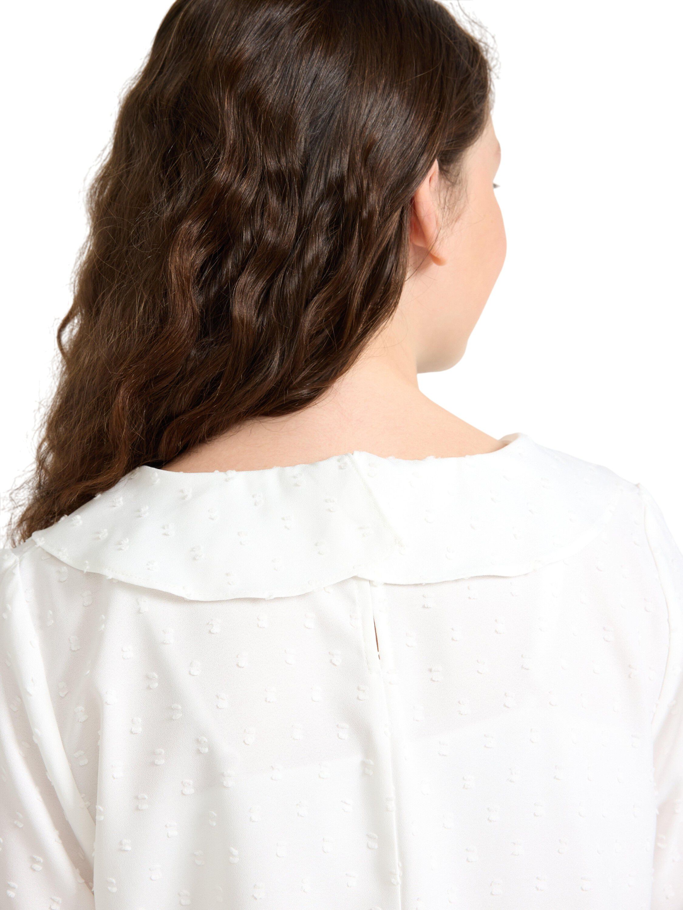 Blouse with flounce at front